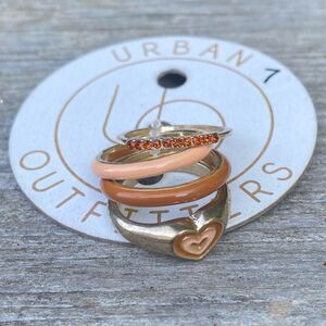 NWT New Urban Outfitters UO Gold/Brown Four (4) Stackable Ring Set. Size 7.